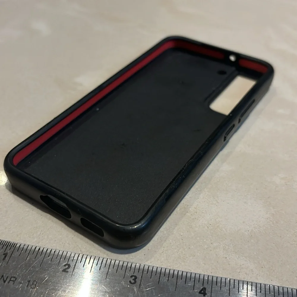 Two Samsung S22 Cases Casetify and Otterbox Black in color